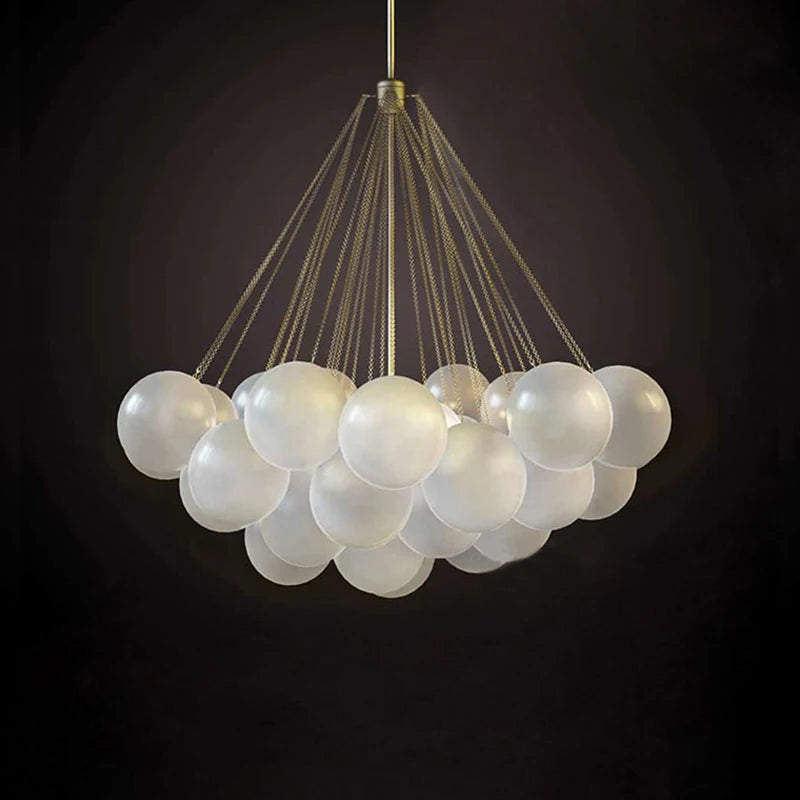 Contemporary semi-flush chandelier featuring multiple globe lights for dining spaces