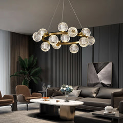 Artistic globe chandelier illuminating a modern lounge setting