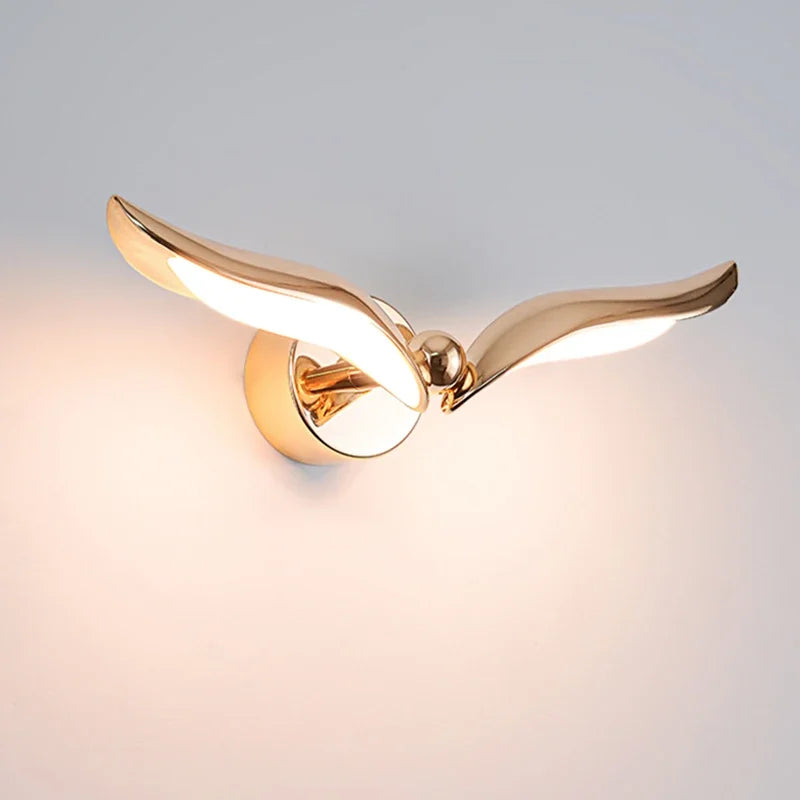 “Creative bird-shaped LED wall sconce for bedroom walls”