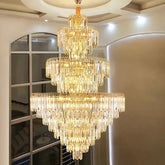 Sparkling crystal chandelier suspended in a grand staircase setting