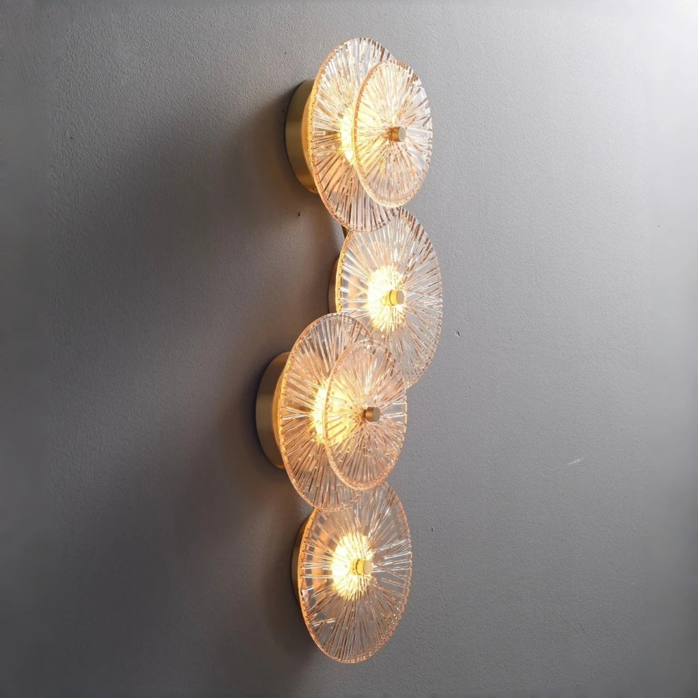 Sculptural wall sconce with crystal shade and up and down glow for corridor lighting