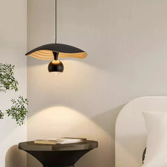 Elegant dimmable pendant lamp installed by a modern bedside table