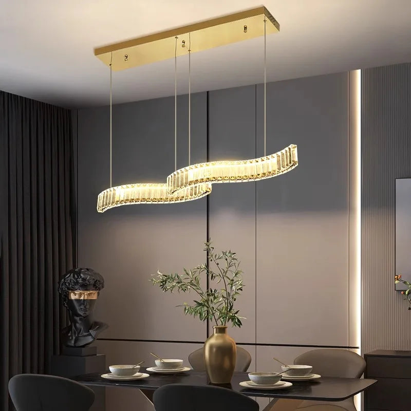 Statement LED pendant light installed above a stylish dining table