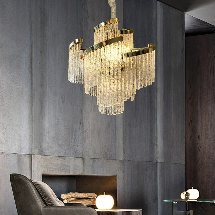 “Gold and silver chandelier with tiered crystal look for foyer and lounge lighting.”