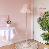 “European pink lace floor lamp with painted wood base and fabric shade”