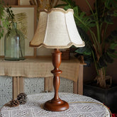 “European solid wood table lamp with scalloped fabric shade”