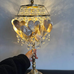 “French luxury heart crystal table lamp with golden iron and shell decor”