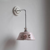 “French pink ceramic bedside wall lamp with floral design”