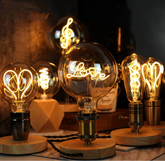 “G125 Edison LED letter bulb, E27 base, warm vintage globe, 3-year warranty”