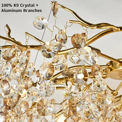 Chandelier with gold branches and crystal elements on a white background