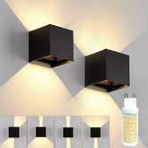 “Black cube LED wall lamp with up-and-down lighting on a modern exterior wall.”