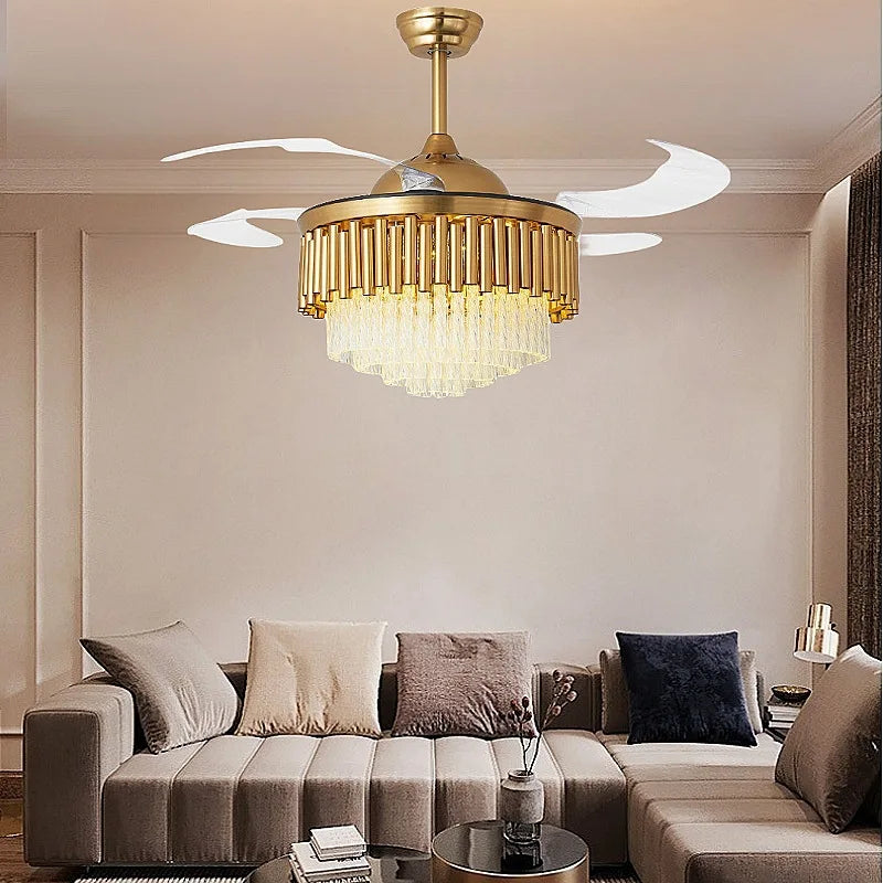 “Gold crystal chandelier ceiling fan with retractable blades in a modern living room.”