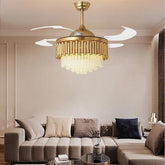 “Gold crystal chandelier ceiling fan with retractable blades in a modern living room.”