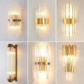 Set of six gold wall sconces with glass accents on a white background