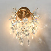 Gold ceiling light fixture with crystal accents on a neutral background