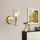 “Gold leaves wall sconce with crystal accents in luxury foyer”