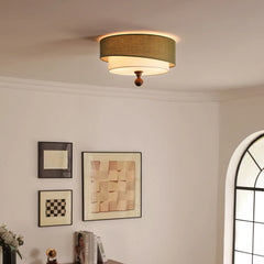 “Flush mount ceiling lamp with green fabric shade and warm wood detailing.”