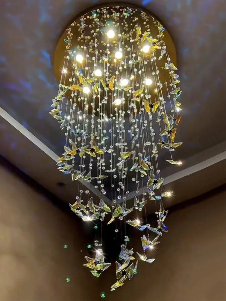 Butterfly-style crystal pendant chandelier creating a vertical statement
