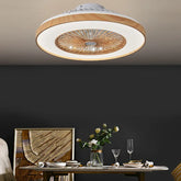 Ceiling light fixture in a dining room setting with a table and decor items