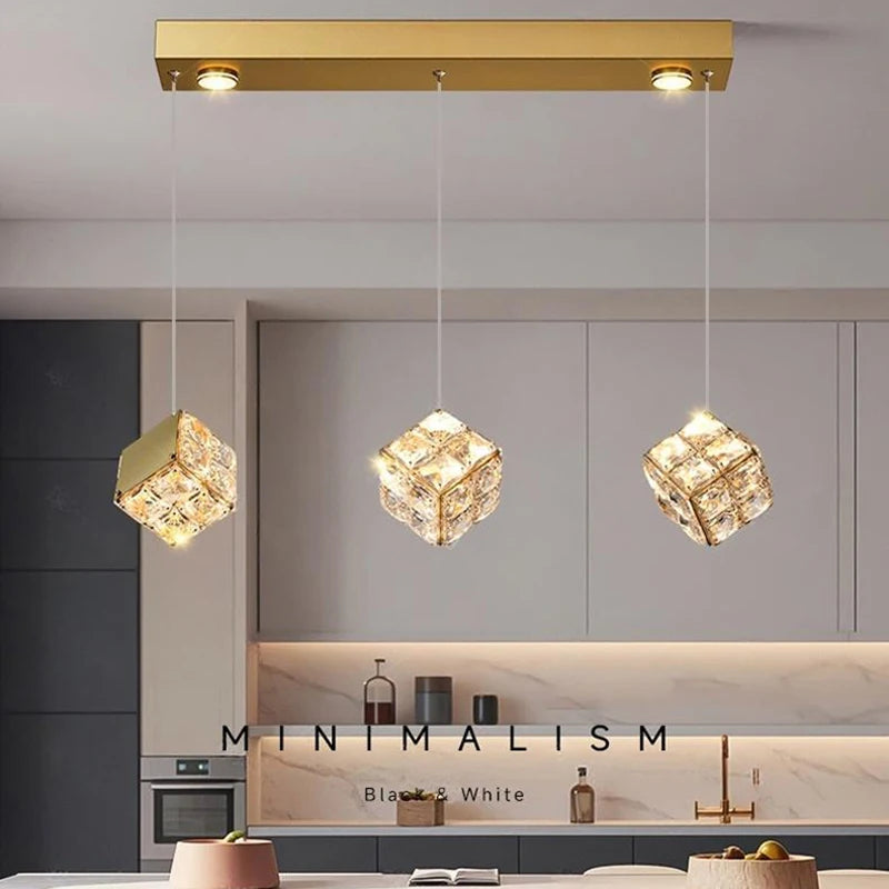 Modern kitchen with gold pendant lights and 'Minimalism' text overlay.