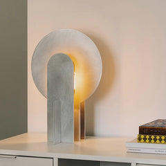 “Industrial aluminum splicing table lamp with sculptural modern design”