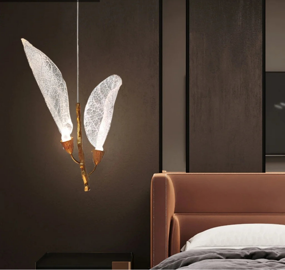 leaf chandelier hanging in a modern high-ceiling interior