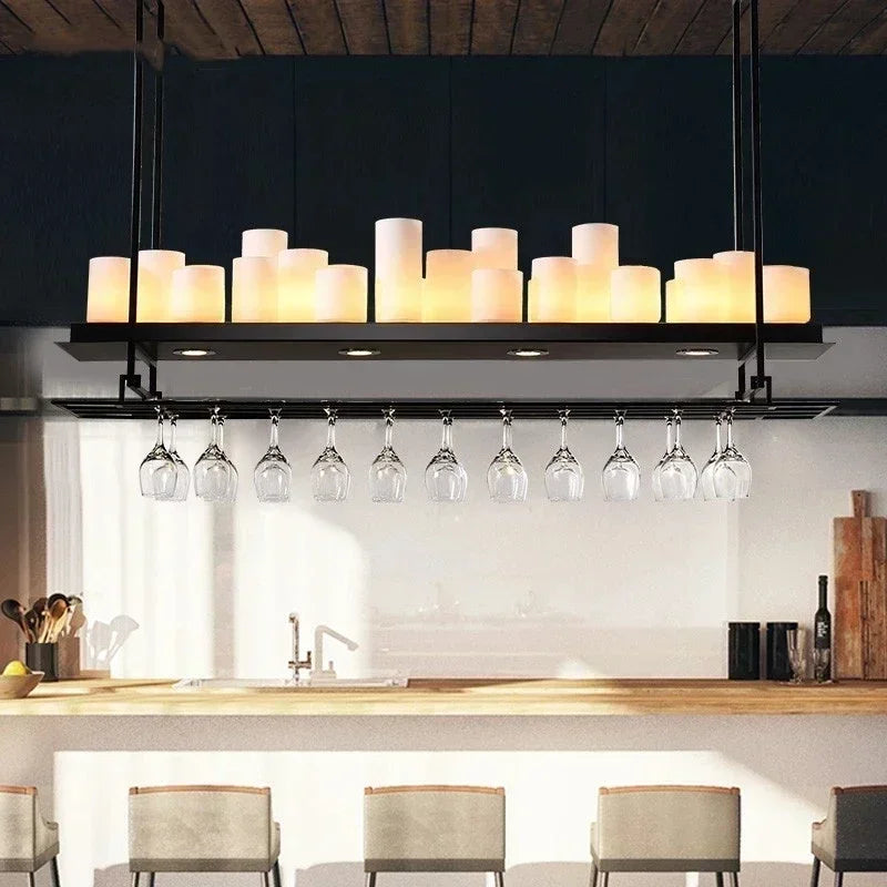 Modern kitchen with pendant light fixture and hanging wine glasses. Liglite black iron Nordic chandelier for dining and hotel interiors