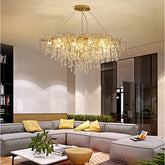 Contemporary chandelier hanging above a designer living room set