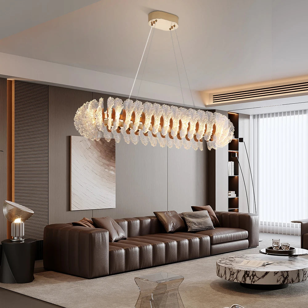 “Liglite gold chandelier over living room with geometric accents”