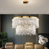 Crystal ring chandelier suspended from a ceiling in a living room