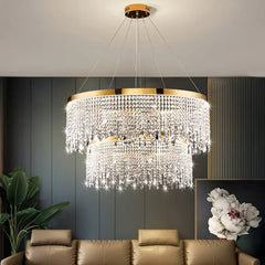 Crystal ring chandelier suspended from a ceiling in a living room