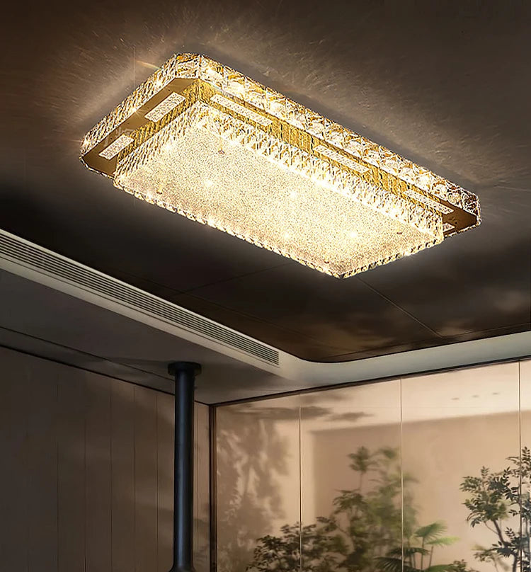 Embossed crystal watery glass ceiling lamp in a gold finish illuminating a modern living room