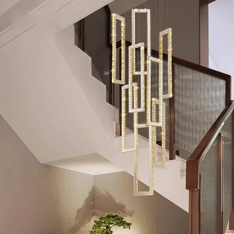 “Double-height geometric crystal pendant for hotel or grand living room lighting”