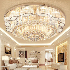 Luxurious chandelier in a living room setting with modern decor.