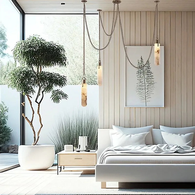 Multi-drop marble pendant chandelier hanging from a modern ceiling