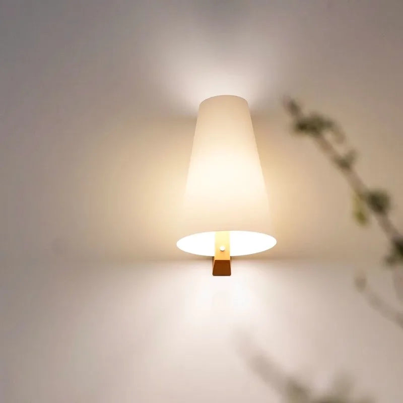 Ceiling light fixture with a soft glow on a neutral background