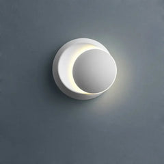 Modern hardwired wall lamp with adjustable head for focused accent lighting