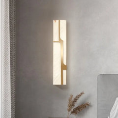 Modern alabaster-style wall sconce with integrated LED for bedroom bedside placement
