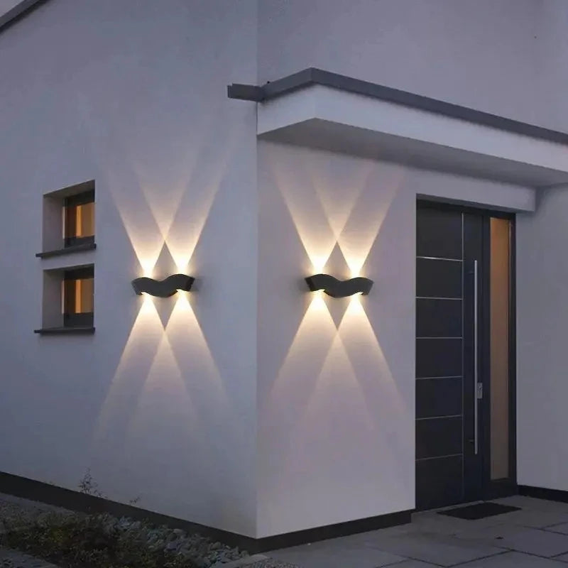 “Contemporary aluminium wall light creating artistic shadows on a wall.”