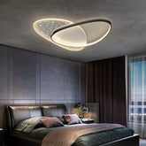 Modern LED ceiling light installed in a contemporary bedroom