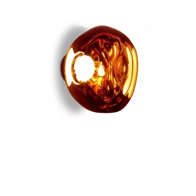 Amber-colored glass bead on a white background; Modern molten lava wall lamp, led bulb, easy-mount, 3-year warranty.