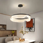 “Modern LED ring pendant light in a dining room”