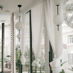 Modern cord pendant light with six light sources for cafe or restaurant seating