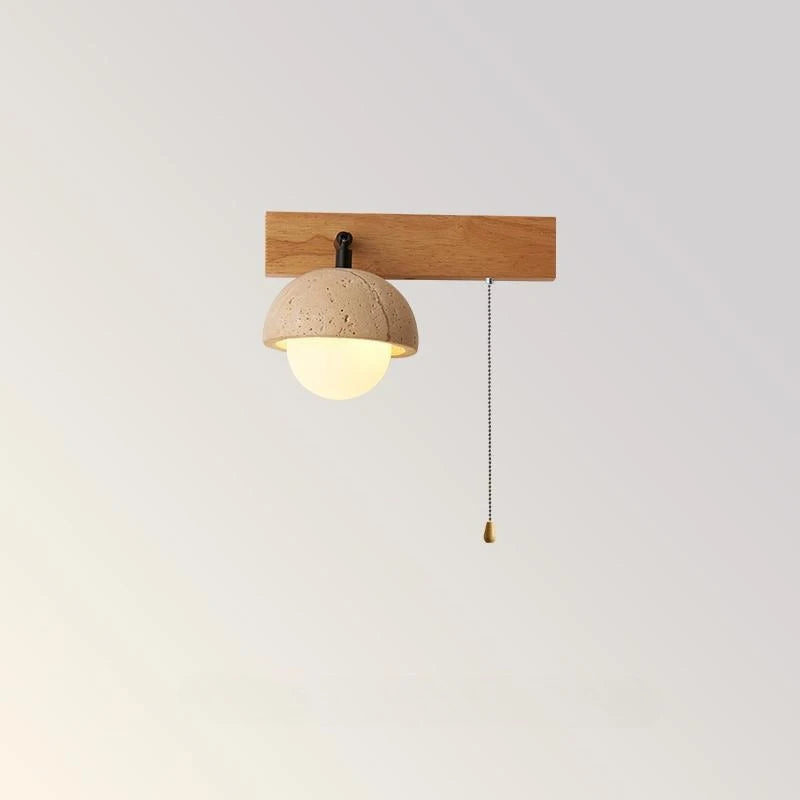 “Compact stone wall light fixture designed for reading and ambient lighting.”