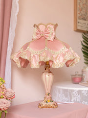 “Modern pink princess table lamp with bow fabric shade and resin base”