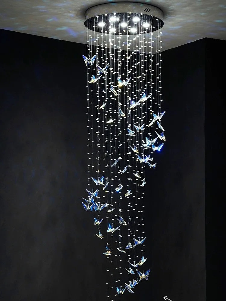 Dimmable crystal chandelier with polished steel finish for high ceilings