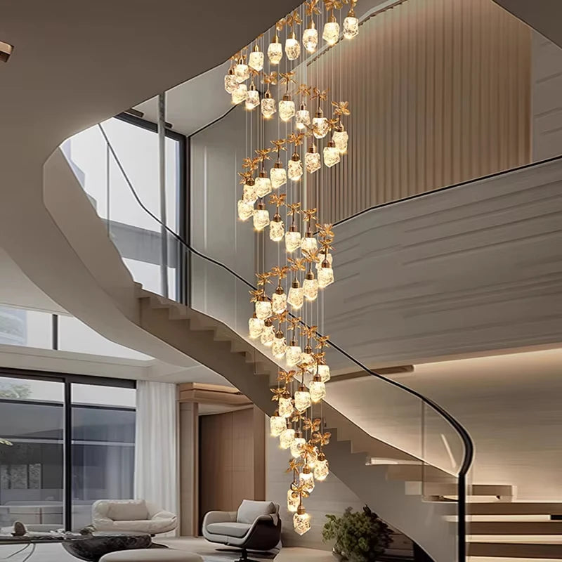 Multi-head crystal spiral pendant light for staircase and double height foyer lighting