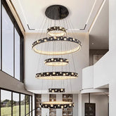 “Modern multi-ring crystal chandelier with integrated LED lighting”