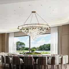 Nickel finish chandelier with shadeless glass elements and LED bulbs included