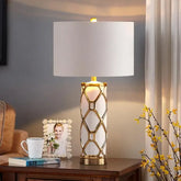 “Nordic ceramic table lamp with gold lattice design for modern bedrooms”